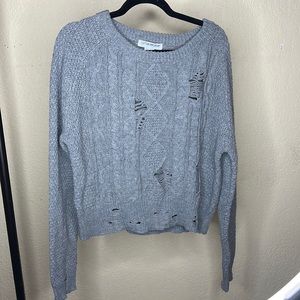 Distressed cable knit sweater size large